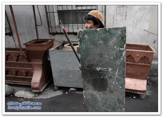 صور: منسيون ومعذبون في اورومتشى الصين
