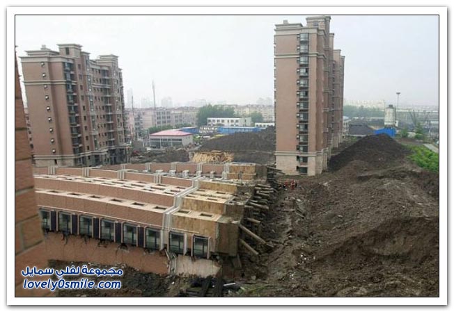 انهيار مبنى من 13 طابق في شنجهاي
