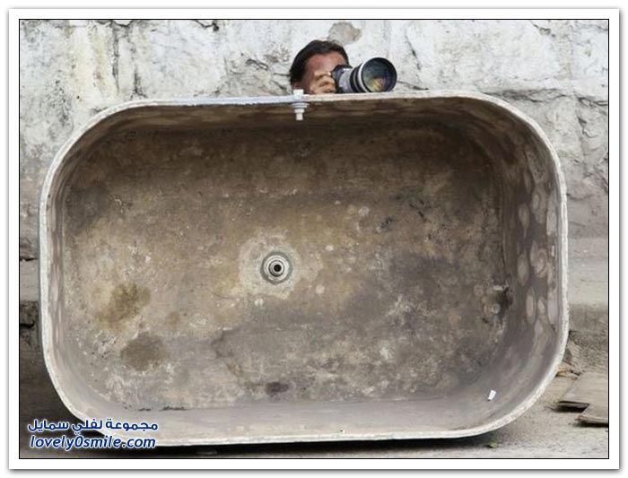 صور للمصورين أثناء التقاط الصور